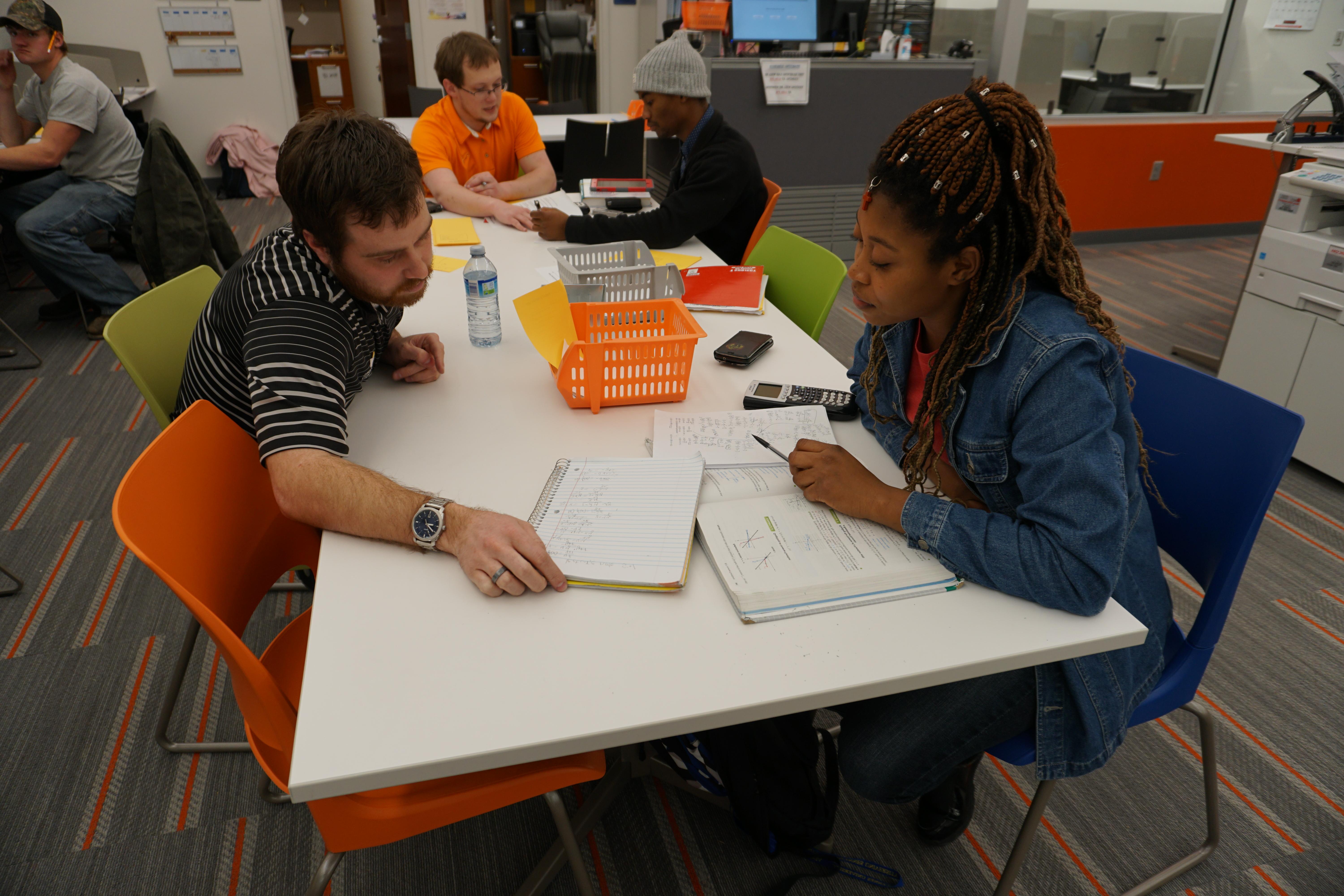 A group of students studying inside Updike Hall