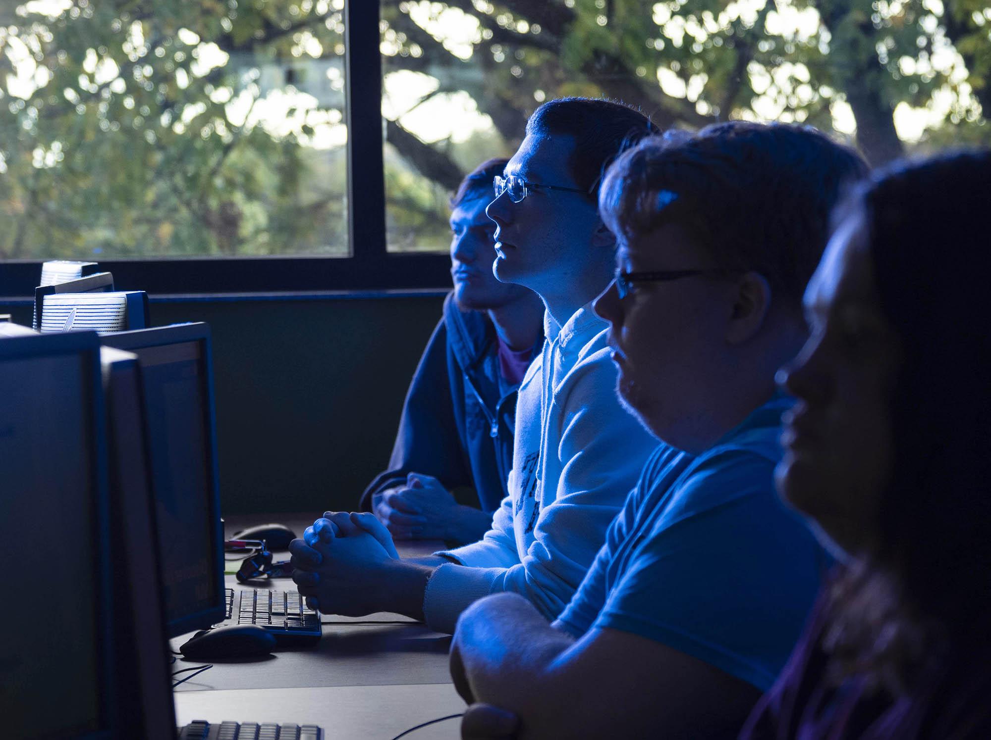 student at computer arcade.