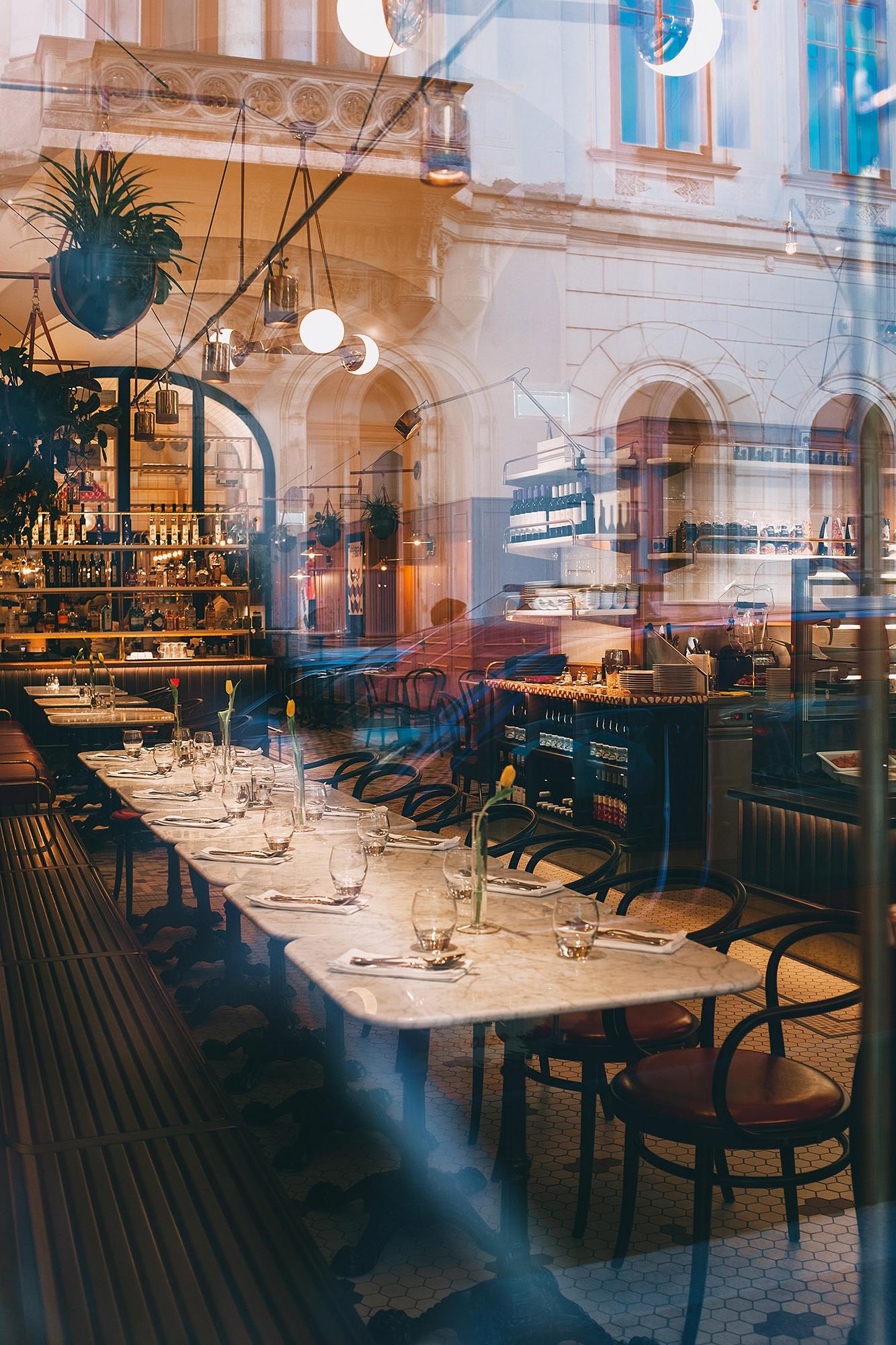 Restaurant window with view inside.