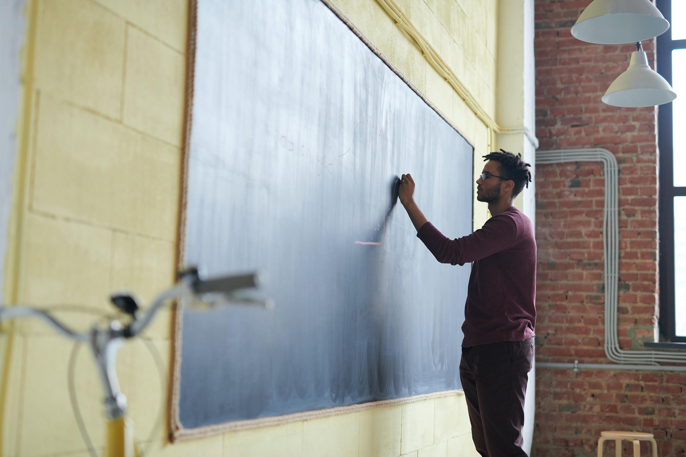 English class student at blackboard