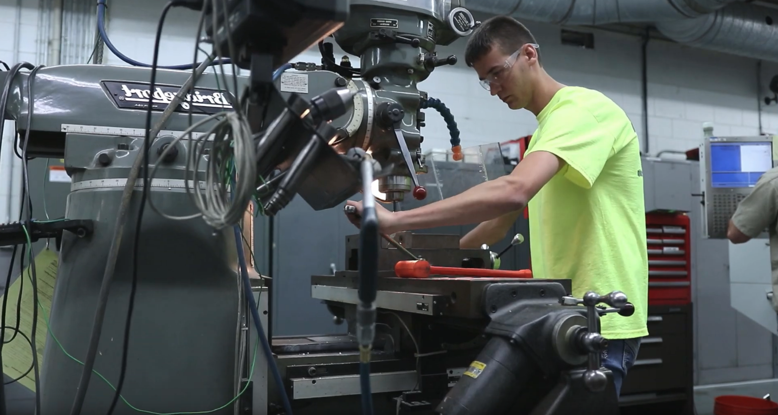 Tech Ed student using machinery.